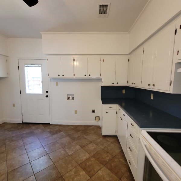 kitchen with white cabinets