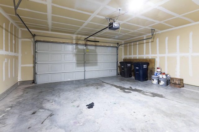 garage featuring a garage door opener