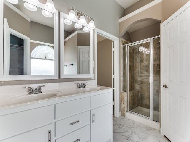 bathroom featuring vanity and walk in shower