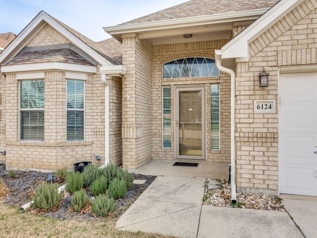 entrance to property with a garage