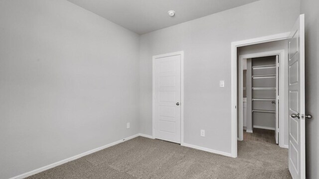 unfurnished bedroom featuring carpet floors