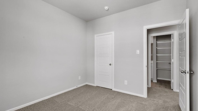 unfurnished bedroom featuring carpet flooring