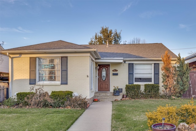 view of front of house with a front yard