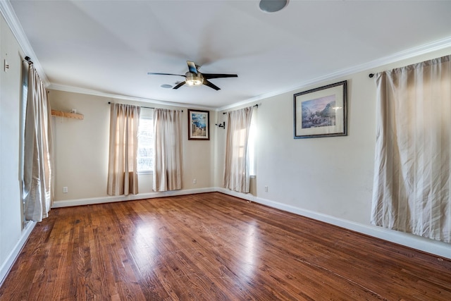 empty room featuring ceiling fan, wood-type flooring, and crown molding