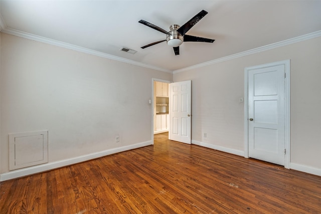 empty room with dark hardwood / wood-style flooring, ceiling fan, and crown molding