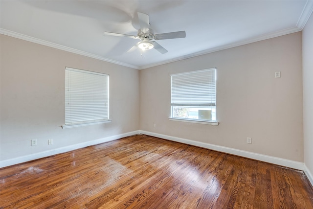 unfurnished room with hardwood / wood-style floors, ceiling fan, and crown molding