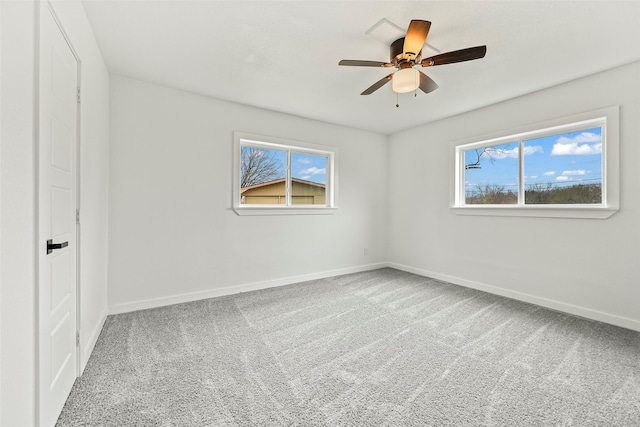 empty room with carpet floors and ceiling fan