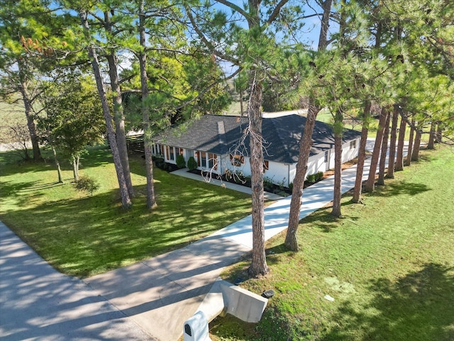 exterior space with a lawn