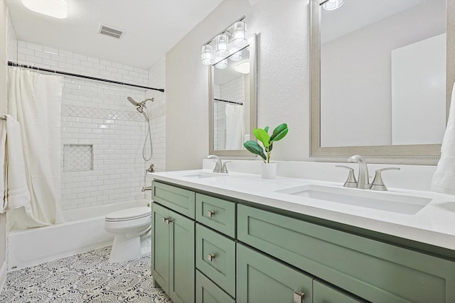 full bathroom with toilet, vanity, and shower / bath combo