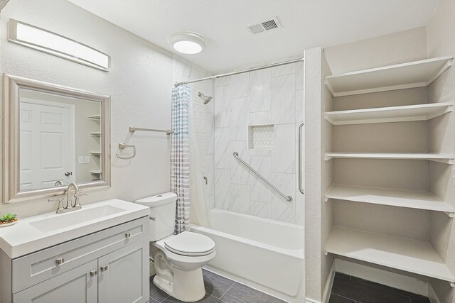 full bathroom featuring toilet, shower / tub combo with curtain, and vanity