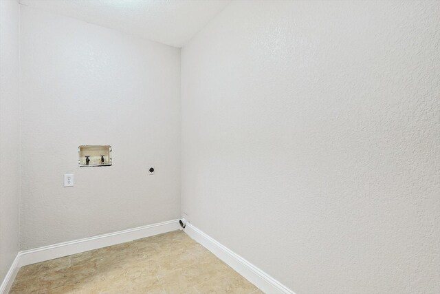 clothes washing area featuring electric dryer hookup and washer hookup