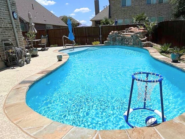 view of pool with a patio area