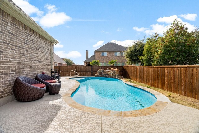 view of front of property featuring a front yard and a garage