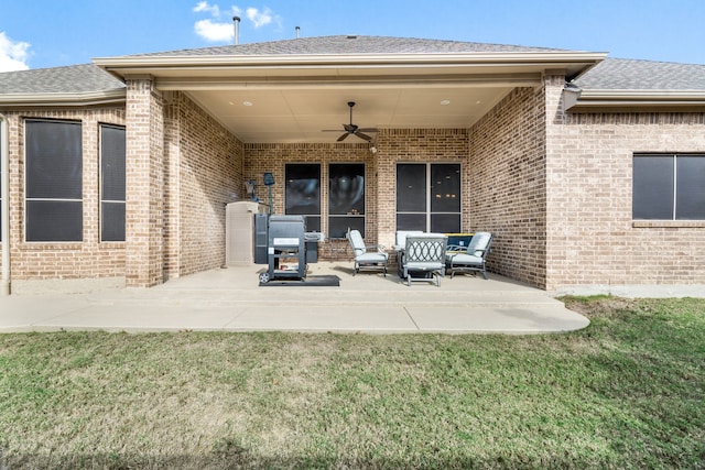 view of pool featuring a lawn, a patio area, and central AC unit