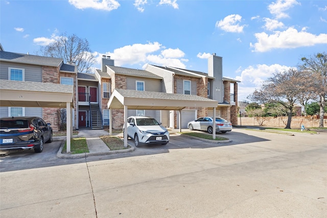 view of front of house with a carport