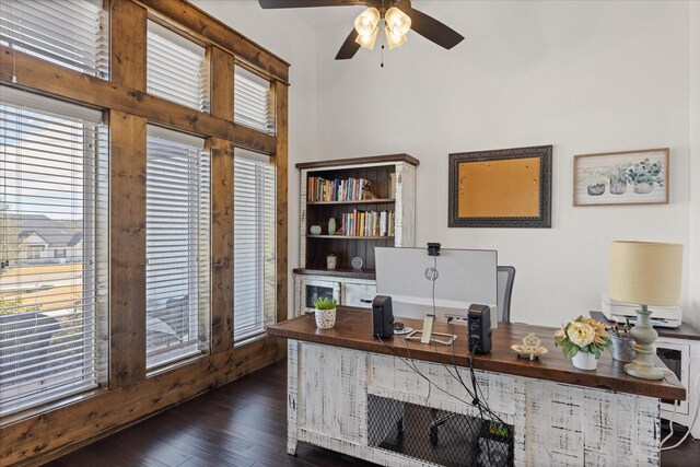 office area with dark hardwood / wood-style floors and ceiling fan