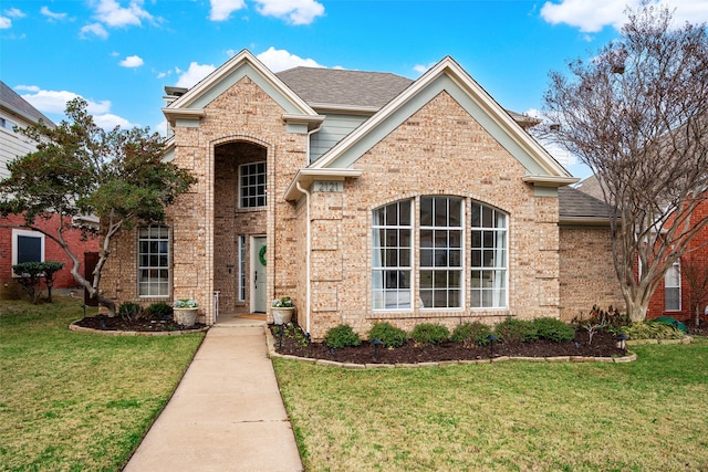 view of front property with a front lawn