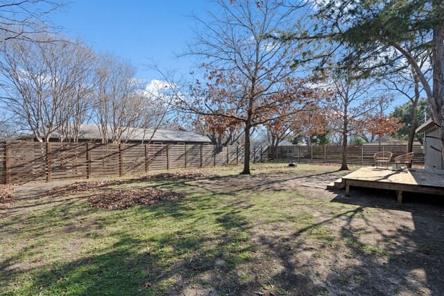 view of yard featuring a deck