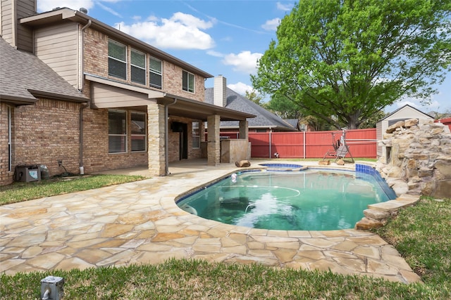 view of pool featuring a patio area