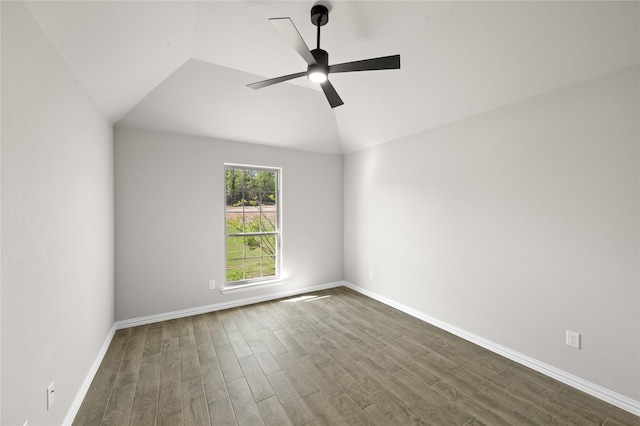 707 Shadle Rd, Poolville, TX 76487 - spare room featuring dark wood finished floors, ceiling fan, baseboards, and vaulted ceiling