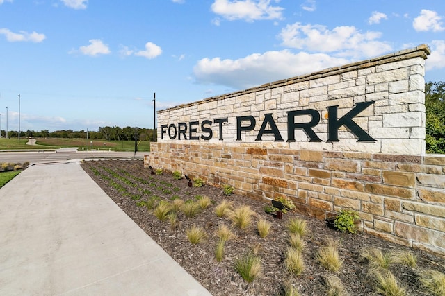 view of community sign