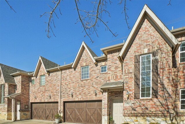 view of front of property with a garage