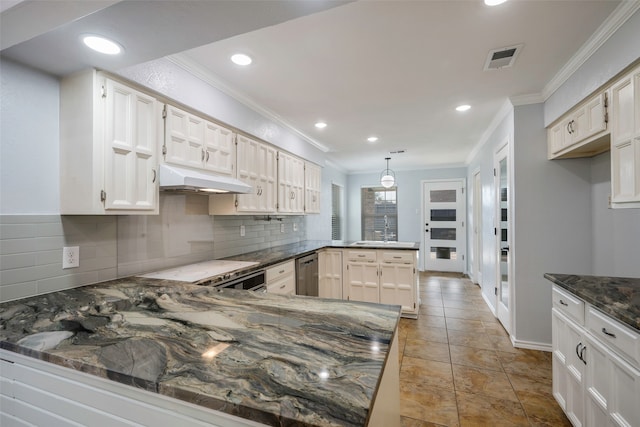 kitchen featuring white cabinetry, crown molding, kitchen peninsula, and dark stone counters