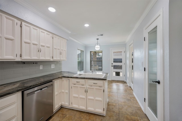 kitchen featuring sink, crown molding, white cabinetry, stainless steel dishwasher, and kitchen peninsula