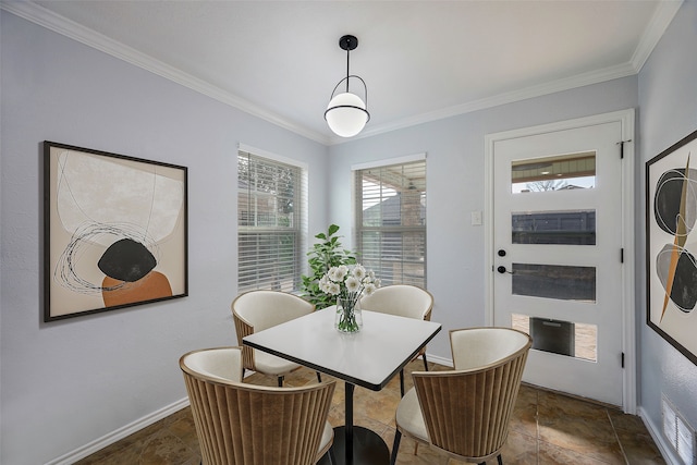 dining area with ornamental molding