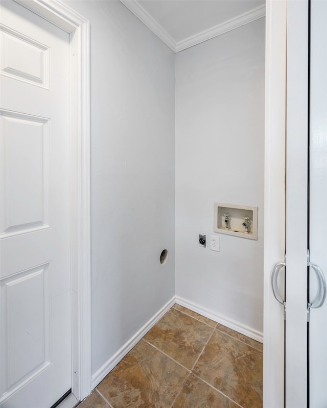 clothes washing area featuring crown molding, washer hookup, and hookup for an electric dryer