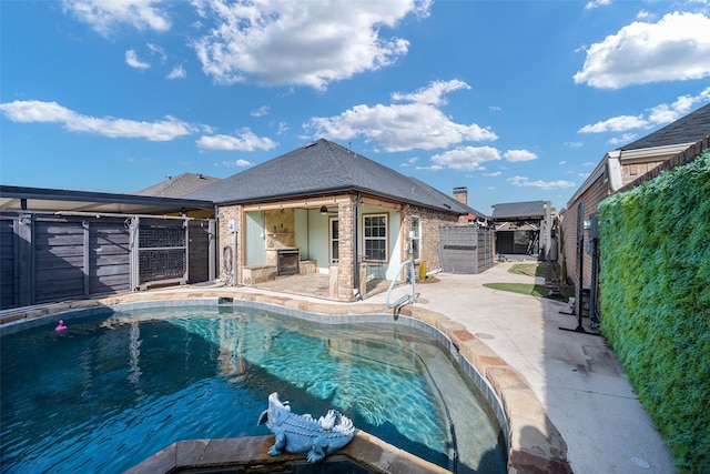 view of pool featuring a patio and ceiling fan