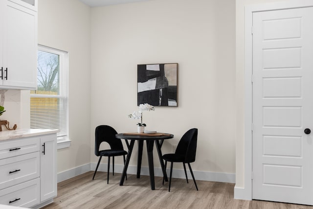 dining room featuring light hardwood / wood-style flooring