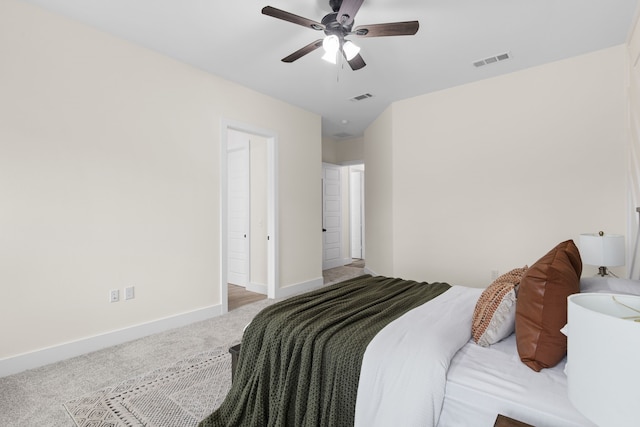 bedroom with ceiling fan and carpet floors