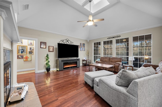 living room with ceiling fan, dark wood-type flooring, vaulted ceiling, and ornamental molding