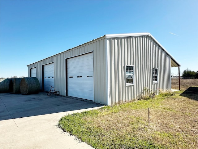 garage with a lawn