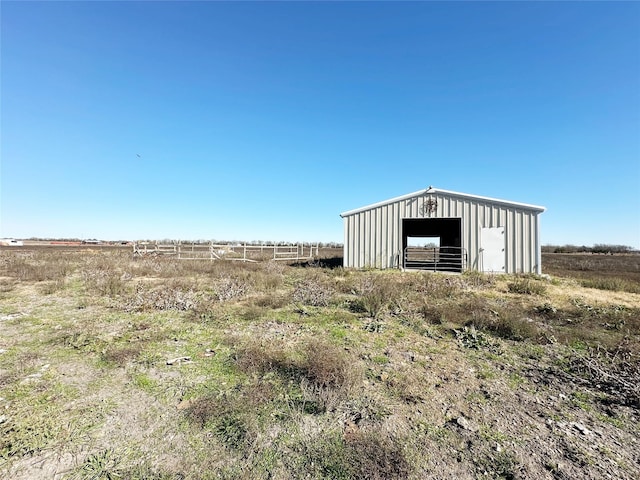 view of outdoor structure featuring a rural view