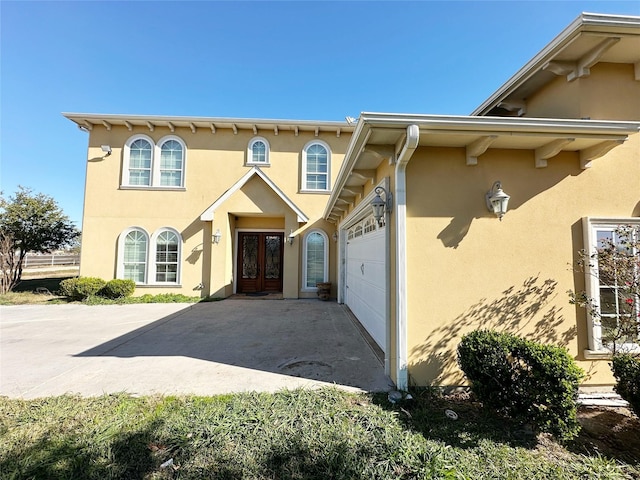 view of front facade featuring french doors