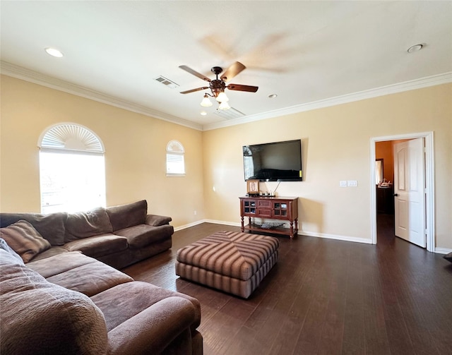 living room with dark hardwood / wood-style floors, ceiling fan, and crown molding