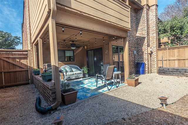 view of patio / terrace featuring ceiling fan