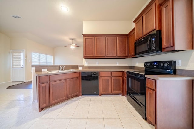 kitchen featuring ceiling fan, sink, kitchen peninsula, light tile patterned flooring, and black appliances