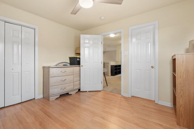 bedroom featuring ceiling fan and light hardwood / wood-style flooring