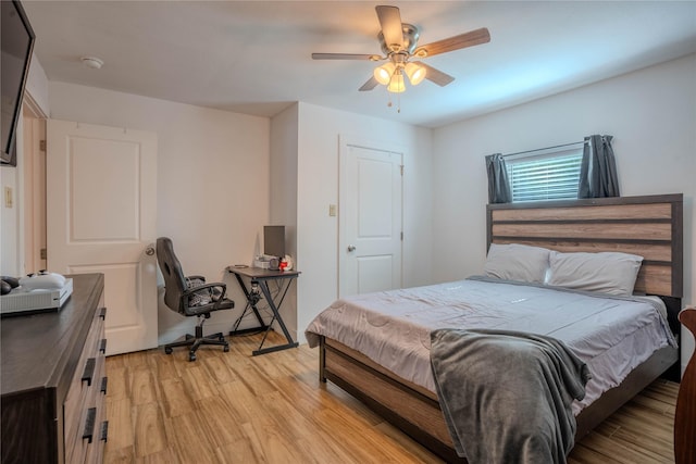 bedroom featuring ceiling fan and light wood-type flooring