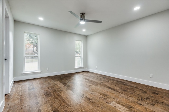 empty room featuring hardwood / wood-style floors and ceiling fan