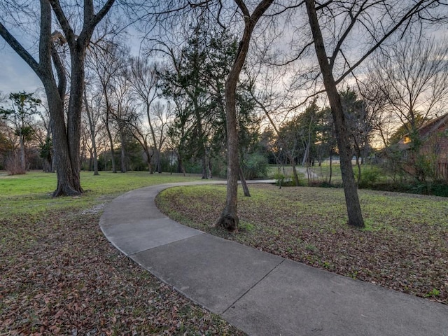 surrounding community featuring a lawn