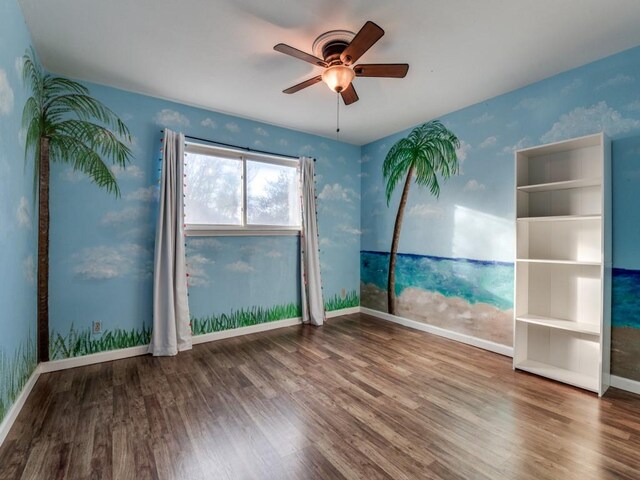 dining area featuring hardwood / wood-style floors and ceiling fan