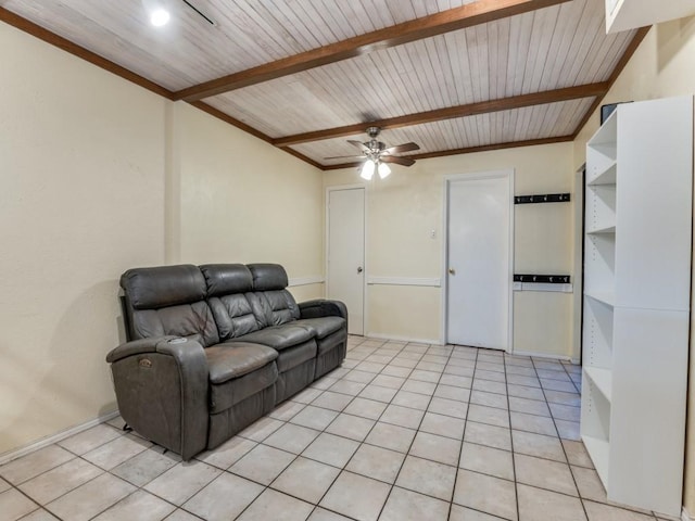 living room with ceiling fan, beam ceiling, wooden ceiling, and light tile patterned floors