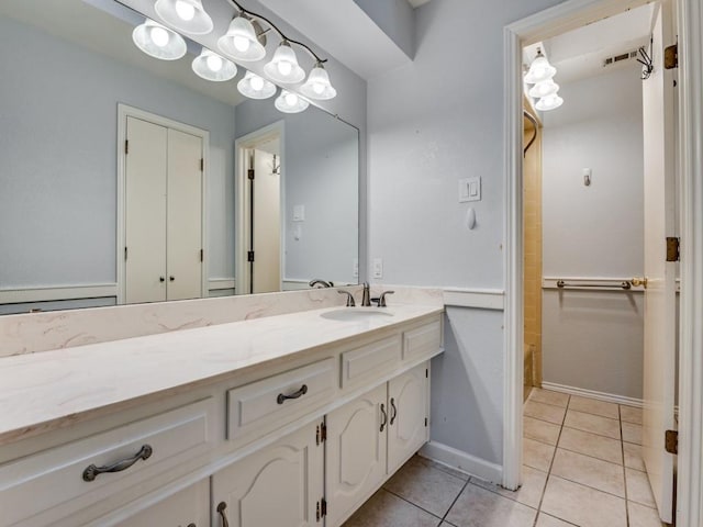 bathroom with vanity and tile patterned floors