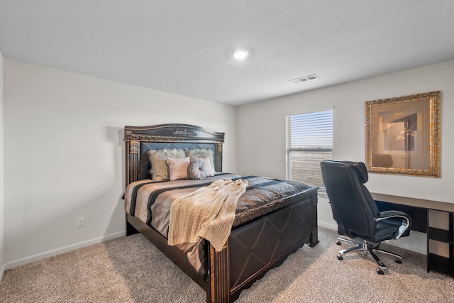 bedroom featuring carpet