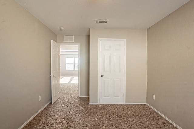 interior space featuring carpet flooring