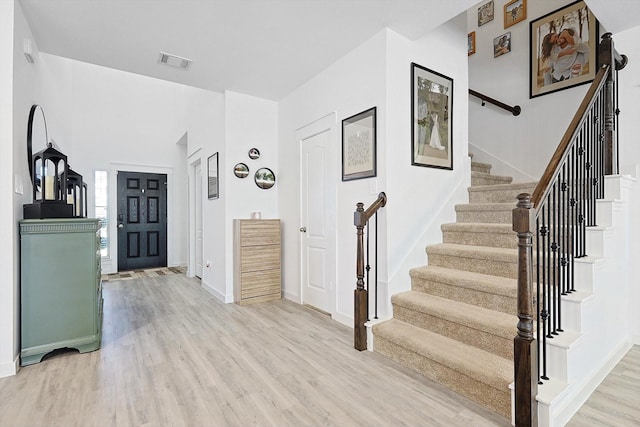 entrance foyer with light wood-type flooring